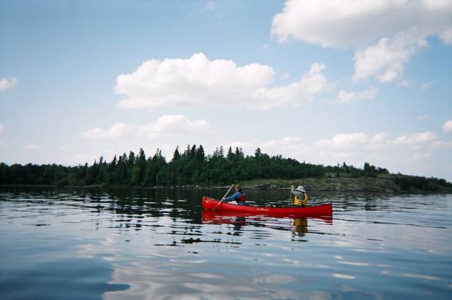 Canoes In Water. Through the Canoe Water and